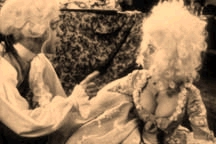 Dishevelled wigs and voluptuous breasts